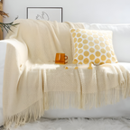 Chunky Knit Throw Blanket with Tassel Fringe in Cream Acrylic