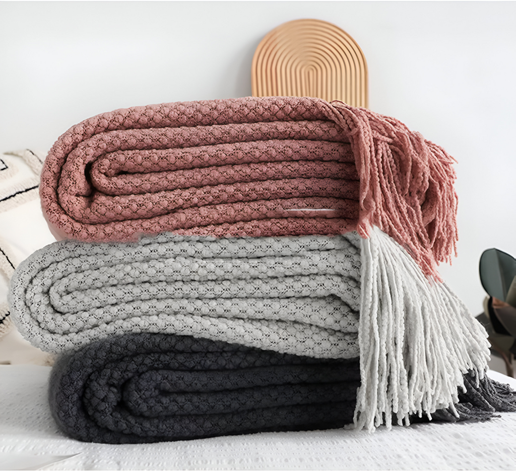 Chunky Knit Throw Blanket with Tassel Fringe in Cream Acrylic
