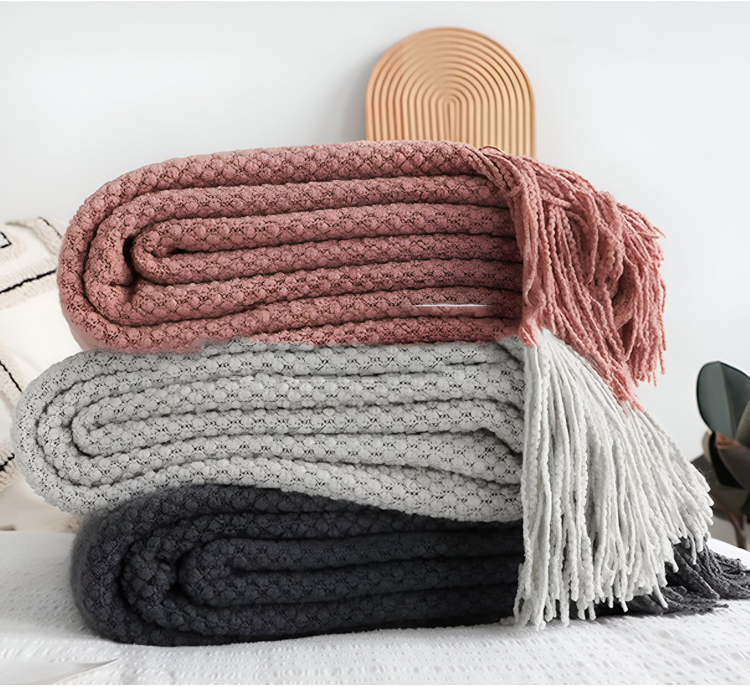 Chunky Knit Throw Blanket with Tassel Fringe in Cream Acrylic