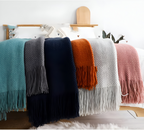Chunky Knit Throw Blanket with Tassel Fringe in Cream Acrylic